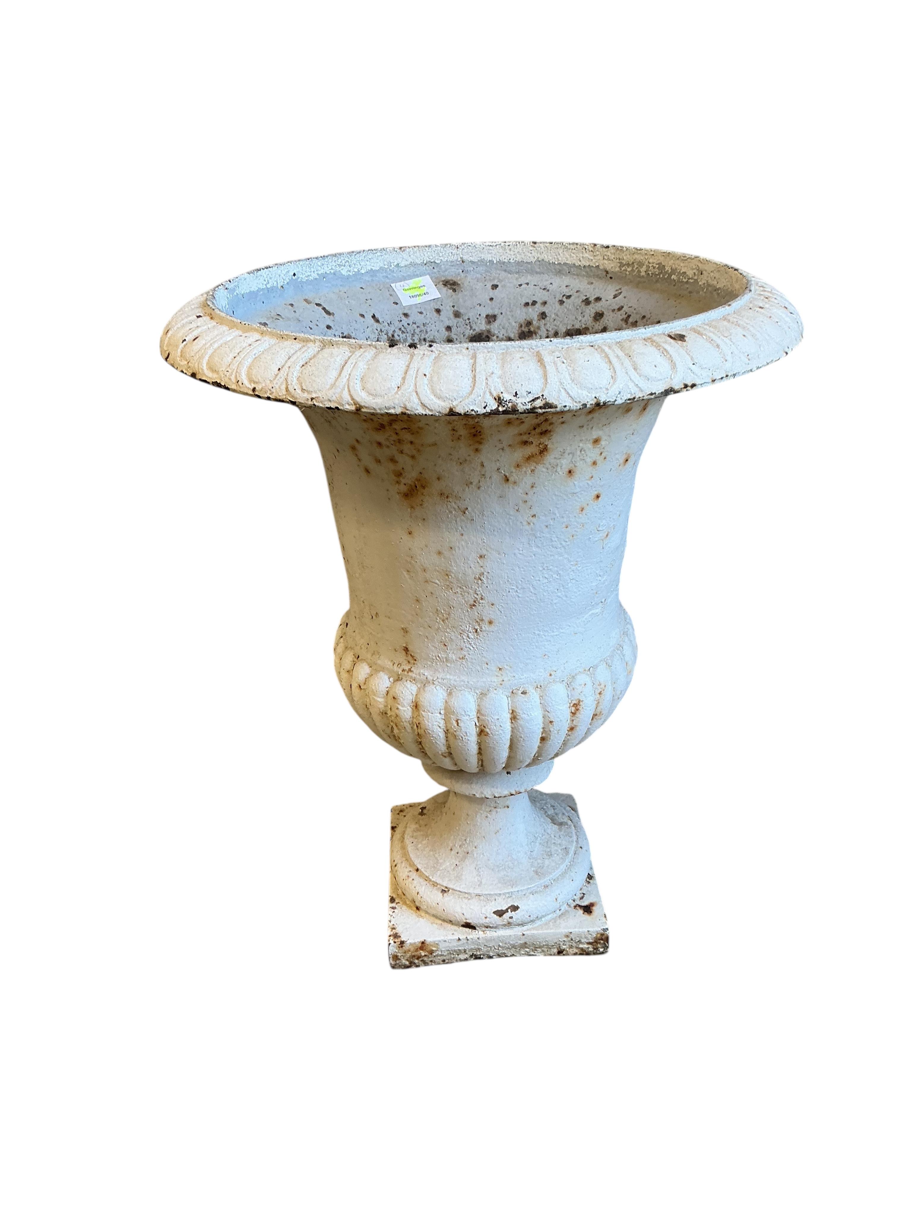Four Victorian white painted cast iron campana garden urns, diameter 50cm, height 64cm
